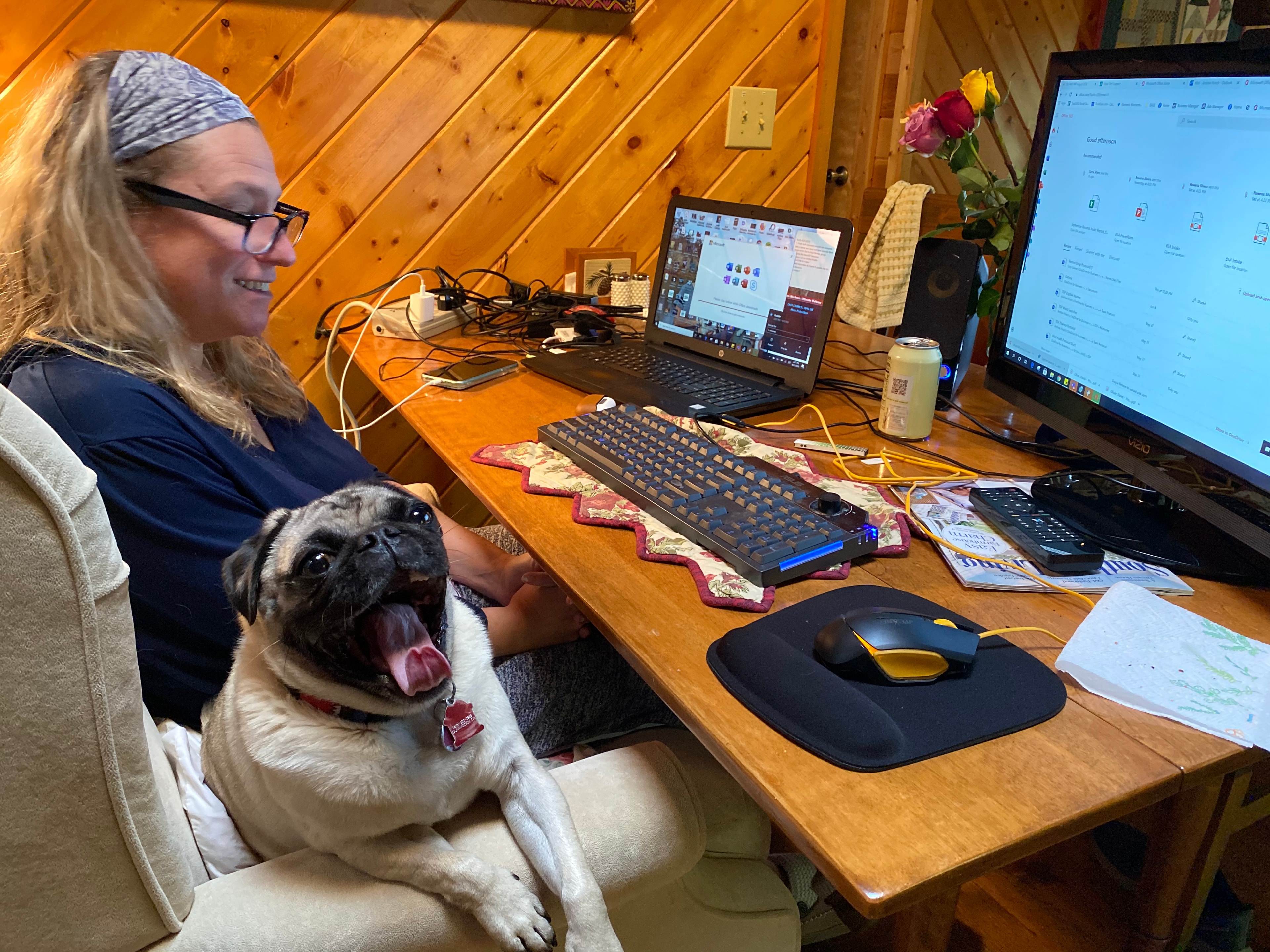Andrea Hirsch with her dog at a casual firm gathering